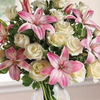 Always A Lady · A romantic gift like this one is always appreciated. An eye-catching display of roses and li...