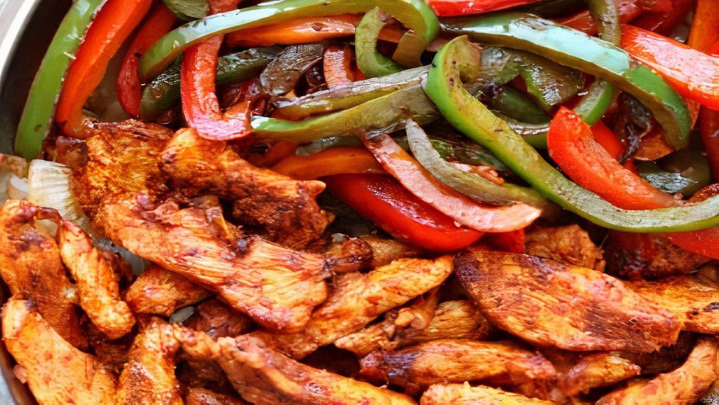 Fajitas  · Your choice of chicken, steak or shrimp sauted with onion and bell peppers and served with your choice of 2 sides. Comes with 2 tortillas, salsa and sour cream.