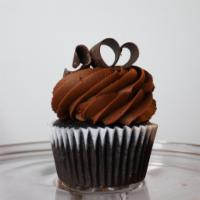 Choco-Lots Cupcake · Devil's food cake, chocolate pudding filling, chocolate buttercream, chocolate sprinkles