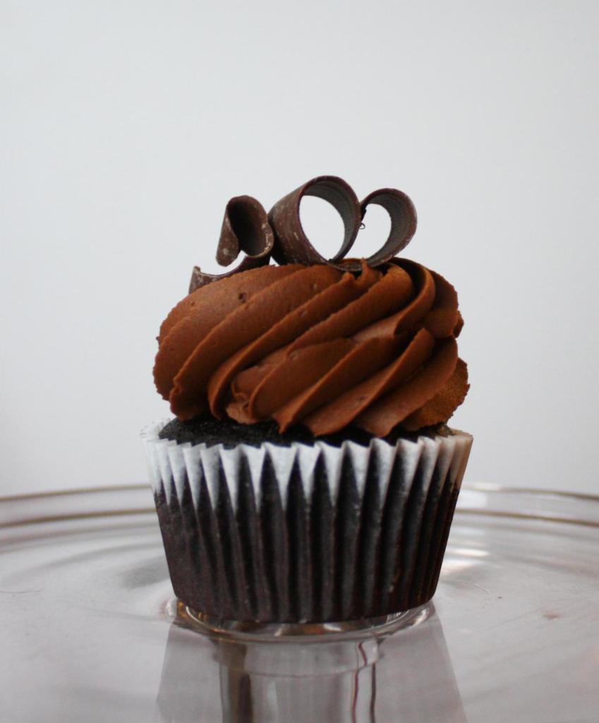 Choco-Lots Cupcake · Devil's food cake, chocolate pudding filling, chocolate buttercream, chocolate sprinkles