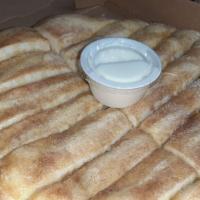 Cinnamon Bread · Cinnamon sugar covered bread with a dipping icing!