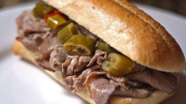 Italian Beef · Lean beef thinly sliced and stuffed into toasted French bread with au jus and hot peppers on the side. Add cheese .50 extra