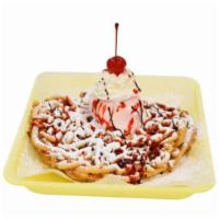 Funnel Cake · A crisp, deep fried cake topped with powdered sugar, whipped cream, strawberry and chocolate...