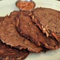 Black Pearl Pancakes · All veggies mixed with rice flour pancakes seasoned with aged Black Bean Miso sauce, four pa...