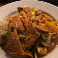 Grilled Tofu Curry Stir  · 6. Pieces of grilled tofu with super healthy veggies tumbled all over Tibetan curry and turm...