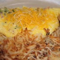 Western · 3 eggs with ham, green peppers, onions and topped with shredded cheese.