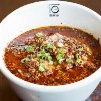 水煮牛肉 / Boiled Meat In Spicy Szechuan Sauce · Hot and spicy.