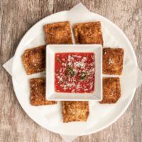 Fried Ravioli · Parmesan, herbs and marinara sauce.