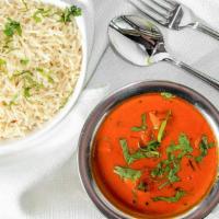 Murgh Makhani · Boneless chicken breast pieces cooked in our tandoor and then added to a tomato, onion and c...