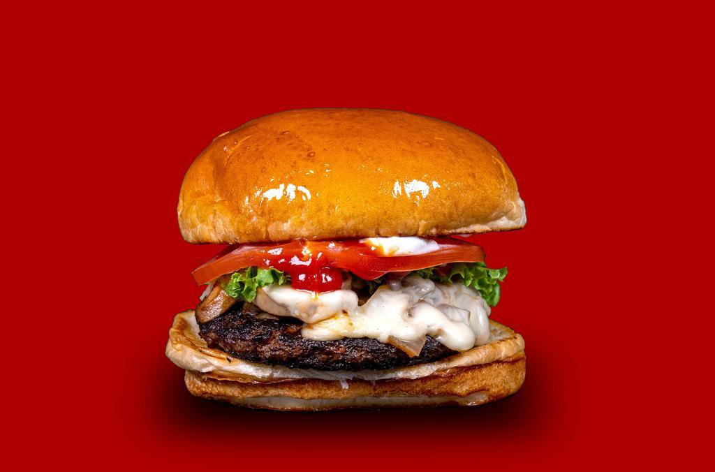 Mushroom Swiss Burger · Lettuce, tomato, grilled onions, sautéed mushrooms, Swiss cheese, ketchup and mayo on a sesame bun.