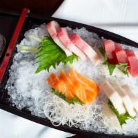 Love Boat For One · 12 pieces sashimi, spa sushi and California roll.