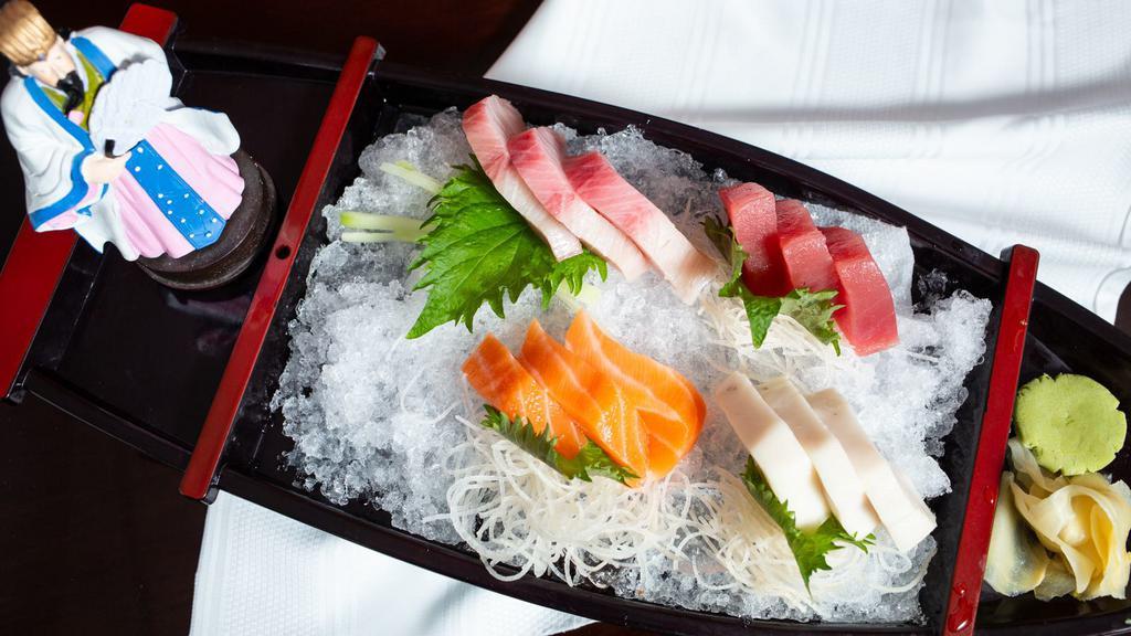 Love Boat For One · 12 pieces sashimi, spa sushi and California roll.