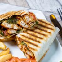 Buffalo Chicken Wrap · Breaded Chicken tossed in Buffalo Sauce and wrapped up in a Flour Tortilla with Pepper-Jack ...