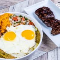 Steak Chilaquiles · Mexican style scrambled eggs with corn tortillas and green chile sauce. Served with rice, be...