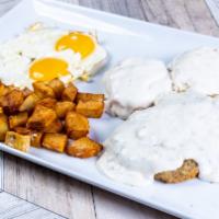 Country Fried Steak & Eggs · Country Fried Steak and Biscuits covered with White Sausage Gravy and Served with
Two Eggs a...