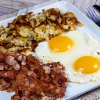 Extra-Large Eggs With Corned Beef Hash · 