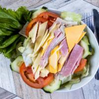 Julienne Salad · Slices of Ham, Turkey, Swiss & American cheese, Tomato Wedges and Hard-Boiled Egg over Icebe...