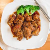 General Tsou'S Chicken · Spicy. Chunks of tender chicken lightly fried and sautéed with mushrooms, red peppers, brocc...