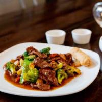 Beef With Mixed Vegetable · Beef stir fried with broccoli, snow peas, carrots, bamboo shoots, and water chestnuts in bro...