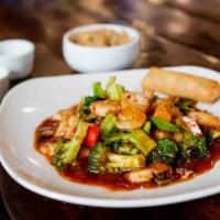 Hunan Shrimp · Spicy. Shrimp with broccoli, snow peas, mushrooms, baby corn, and red peppers in black bean ...