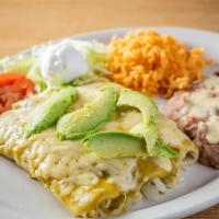 Enchiladas Supreme · Three tortillas filled with your choice of meat, topped with out homemade tomatillo green sa...