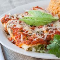 Veggie Enchiladas · Made with spinach mix, ranchero sauce, and melted chihuahua cheese.