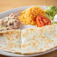 Quesadilla Supreme · Large flour tortilla filled with your choice of meat or plain, melted cheese, sour cream, an...