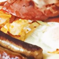 Big Man Breakfast · Three extra-large eggs with half a slice of ham, three bacon strips, three sausage links, an...