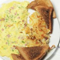 Western Omelette · With ham, green peppers, onions, and American cheese.