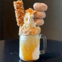 Cinnamon Crunch Love · A to go cup filled with rich vanilla ice cream blended with Cinnamon Toast Crunch cereal. To...