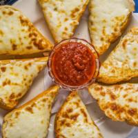 Italian Cheese Bread · Toasted Vienna bread loaded with mozzarella cheese. Served with marinara sauce.  Add peppero...
