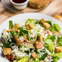 Dinner Salad · Lettuce mix, red onion, tomatoes, cucumbers, croutons and choice of dressing.