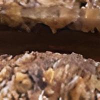German Chocolate · German Cho cake topped with a coconut, caramel pecan icing.