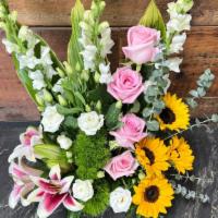 Alluring Beauty · This beautiful and elegant arrangement displayed in a wooden craft box.  (Includes: four sun...