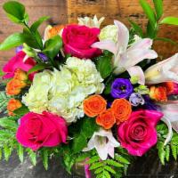Mama Mia! · Gorgeous White Hydrangeas alongside vibrant Hot Pink Roses, Stargazer Lilies, Orange spray r...