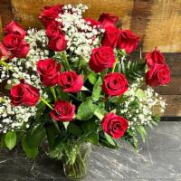 2 Dozen Red Rose In Vase · 2 Dozen Gorgeous Red Roses wrapped in designer paper. Includes Greens and Babies Breath and ...