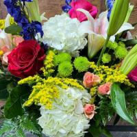 A Good Day · Tall arrangement filled with hydrangeas, lilies, roses, larkspur and more.