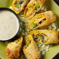Sw Egg Roll · Seasoned chicken breast, cheese, corn and black bean salsa, avocado wrapped in an egg roll a...