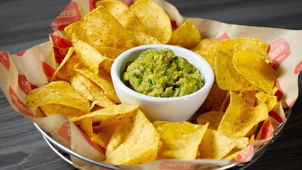 Guac & Chips · Housemade guacamole and tortilla chips.
