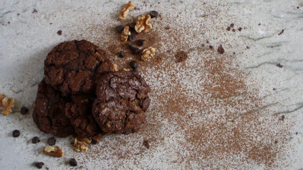 Mudslide Cookies · Warm freshly baked rich double chocolate cookies with chocolate chips and walnuts.