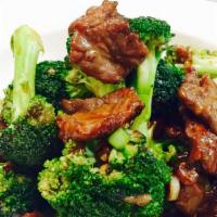 Beef With Broccoli · Stir-fried beef with fresh crip broccoli florets and carrots in our brown sauce.