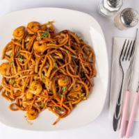 Shrimp Lo Mein · Shrimp with cooked noodles, tossed and stir-fried with a medley of napa cabbage, carrot, and...