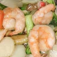 Seafood Delight · Jumbo shrimp, scallop, crabmeat with mixed vegetable in white sauce.