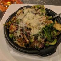Brussel Sprouts · sauteed shaved sprouts, bacon, caramelized onions, topped with parmesan cheese.

* GLUTEN FR...