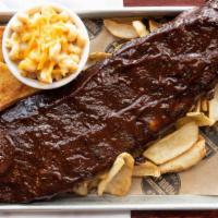 Louis Pork Ribs (Whole) · 5-hour Cherrywood smoked ribs, Texas toast, BBQ. / served with mac n' cheese, choice of side.