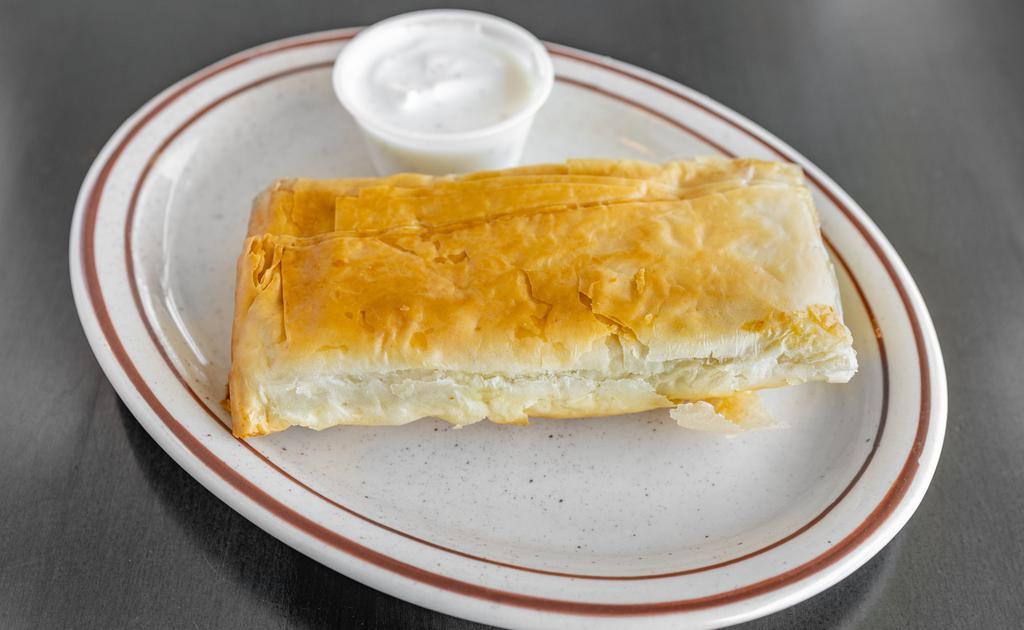 Spinach Pie · Vegetarian. Greek spinach pie made with filo pastry, cooked spinach and feta cheese, served with tzatziki sauce.