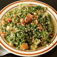 Tabouli Salad · Vegan. Chopped parsley, tomatoes, onions, bulgur, lettuce, lemon, mint and olive oil.