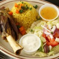 Lamb Shank Platter · Lamb shank slowly cooked with carrots, special herbs, and spices.