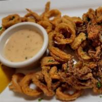 Calamari Fritti · Tender calamari, lightly breaded and fried. Served with our special sauce and lemon wedges.