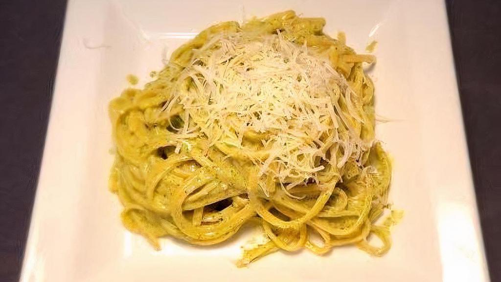 Linguine Pesto · Linguine noodles cooked in white wine with a pureed basil pesto cream sauce and Pecorino cheese. Topped with parmesan cheese.